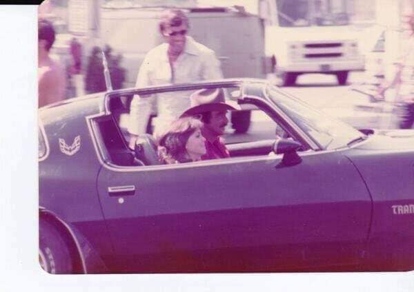 Smokey and the Bandit movie behind the scenes pic with Burt Reynolds and Sally Field in Trans Am.