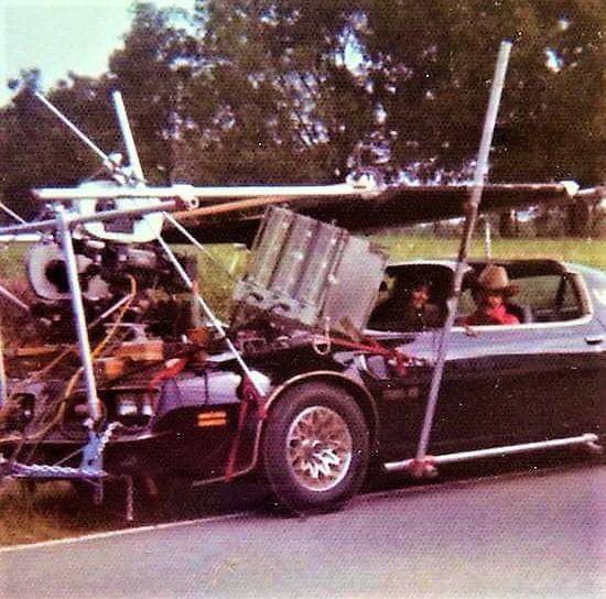 Smokey and the Bandit movie behind the scenes pic with Burt Reynolds and Sally Field in the Trans Am.