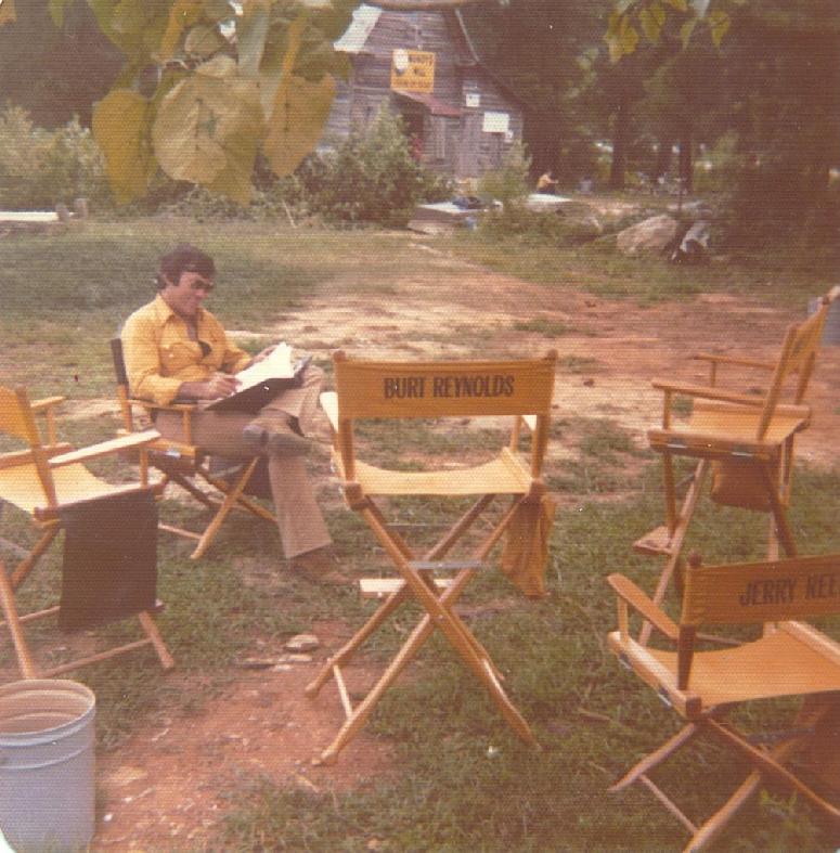 Smokey and the Bandit movie behind the scenes pic with Hal Needham going over the script.